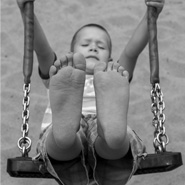 child-on-swing